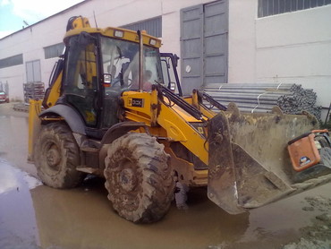 Погрузчик с обратной лопатой JCB 3СХ