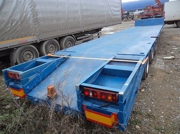 низкорамный полуприцеп тяжеловоз трал 40 тн на SAF