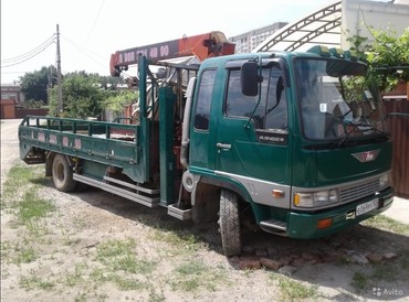 Грузоперевозки манипулятором-низкорамником