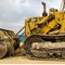 John Deere 850J, Коматсу