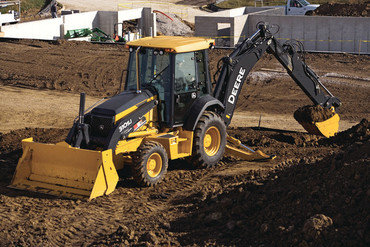 New Holland B110, John Deere325J
